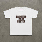 Brunettes Do It Better Baby Tee in White, flat lay