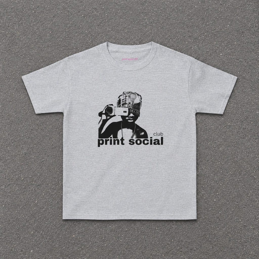 Camera Kid Baby Tee in Ash, flat lay
