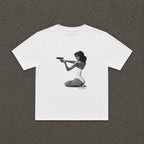 Hands-Up Baby Tee in white, flat lay with a black and white kneeling figure print