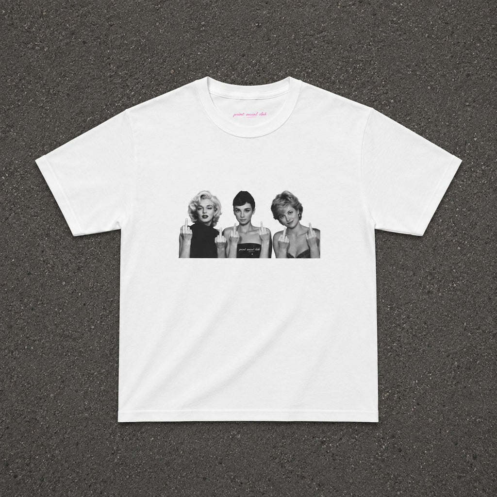Iconic 3 Baby Tee in white, flat lay with a black and white three portraits print
