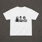 Iconic 3 Baby Tee in white, flat lay with a black and white three portraits print