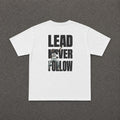 LNF Baby Tee in white, flat lay of the back with the Lead Never Follow print