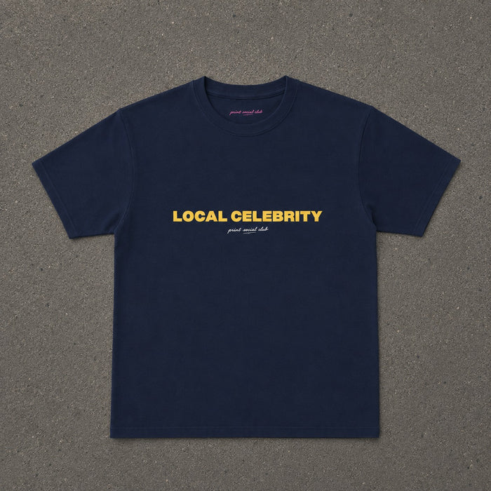 Local Celebrity Baby Tee in Navy, flat lay