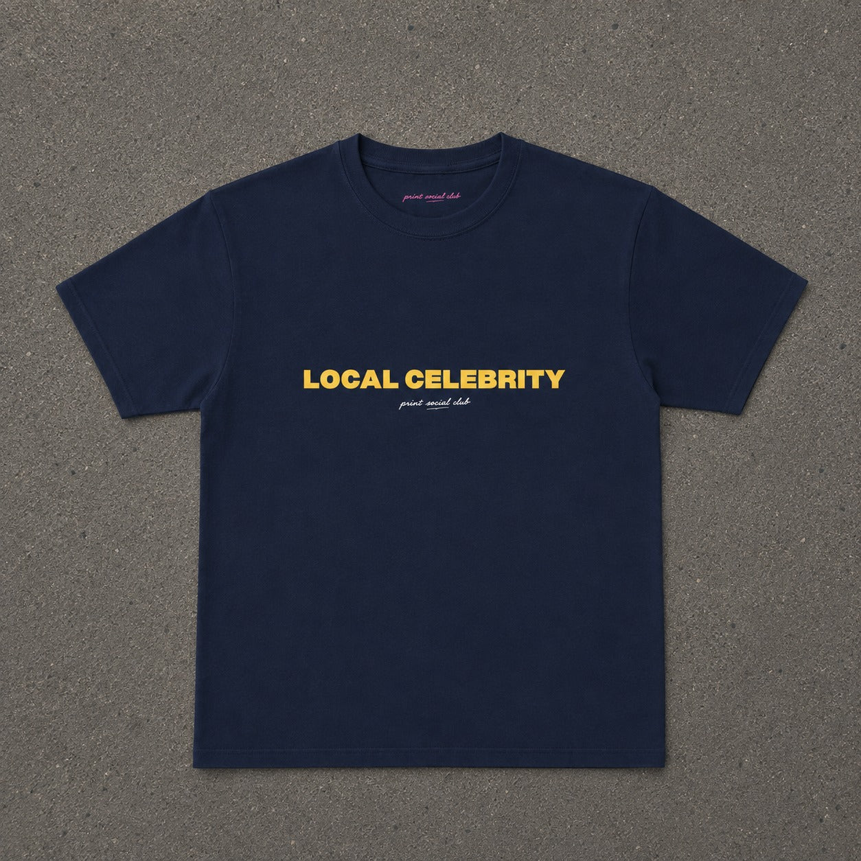 Local Celebrity Baby Tee in Navy, flat lay