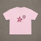 Shooting Stars Pink Baby Tee in Light Pink, flat lay