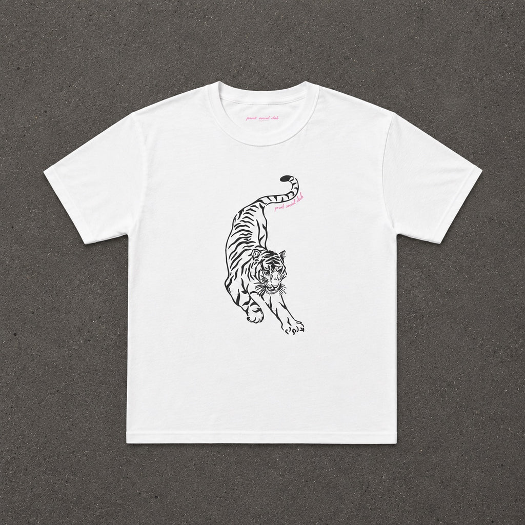 Stretching Baby Tee in white with a black line art tiger print