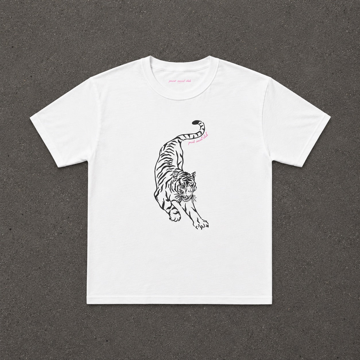Stretching Baby Tee in white with a black line art tiger print