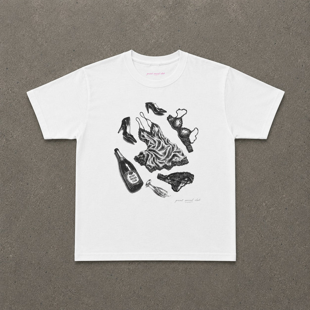 The Aftermath Baby Tee in White, flat lay